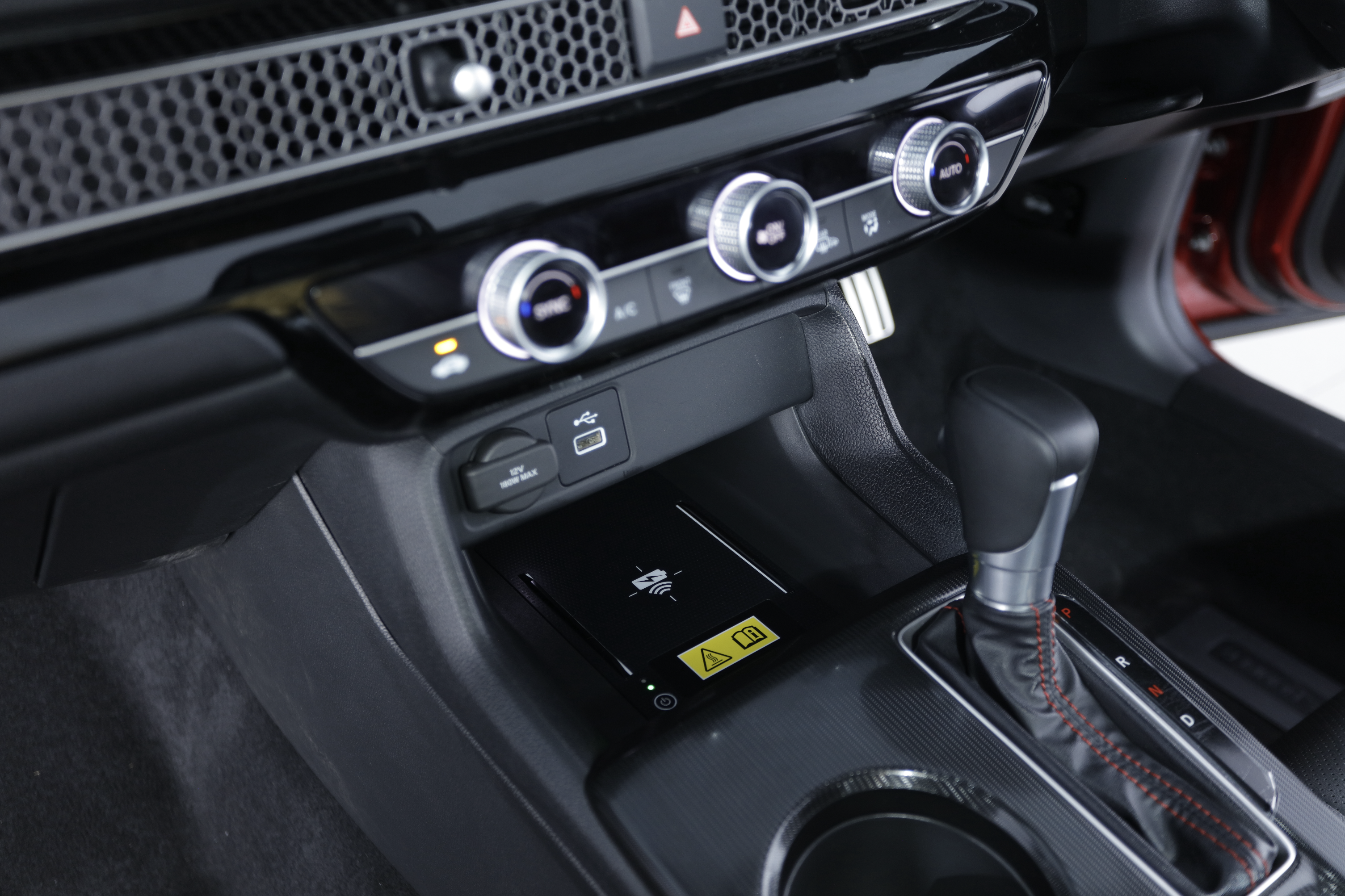 Honda Civic RS Turbo 2026 wireless phone charging pad in center console